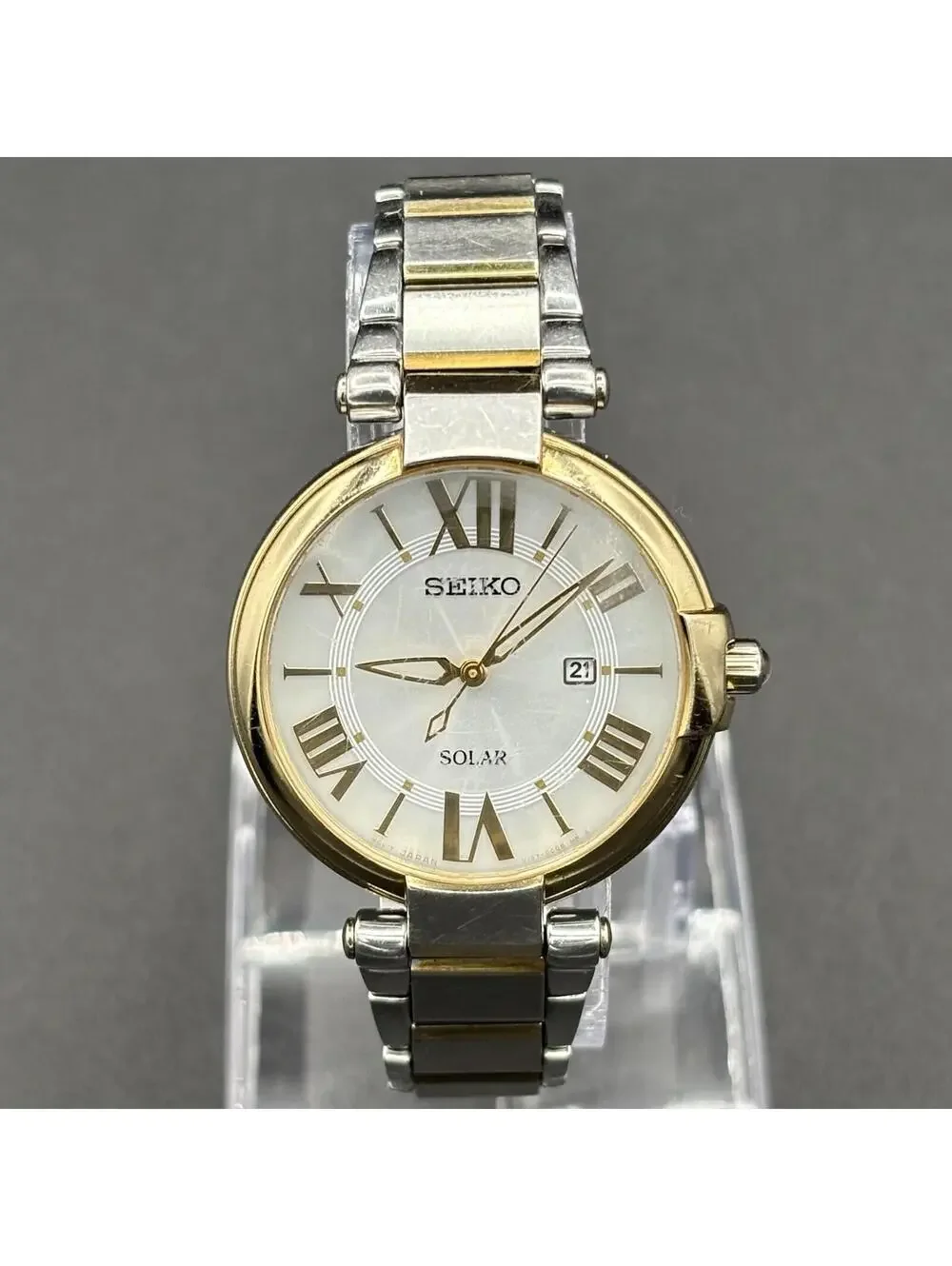 Seiko Solar Two-Tone Silver Dial Roman Numeral Ladies 32mm Watch SUT154P1